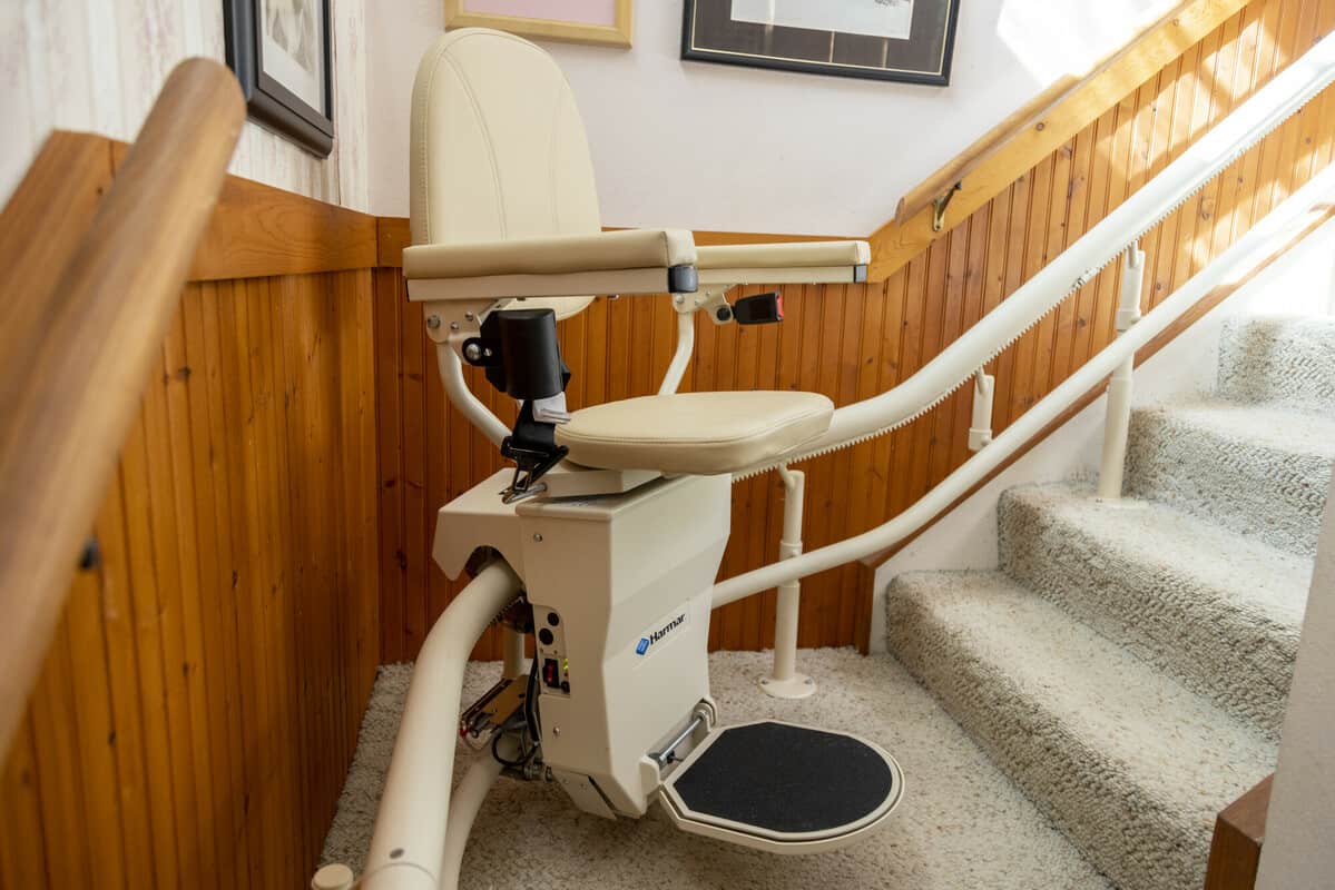 Handicare 2000 commercial stairlift installed on outdoor staircase for safe access to church entrance 
