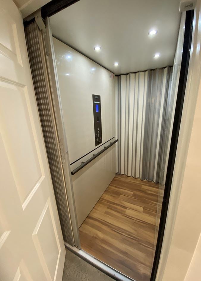 home elevator with wood floor installed by Lifeway Mobility