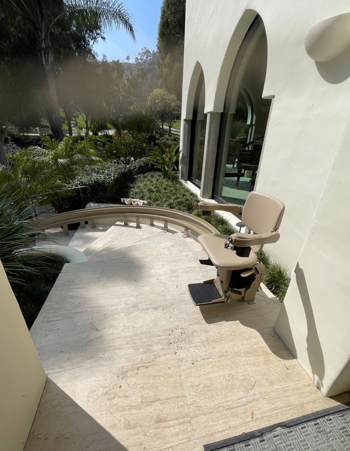 outdoor curved stair lift installed by Lifeway Mobility