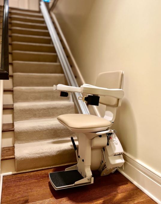 stairlift installed by Lifeway with cream upholstery
