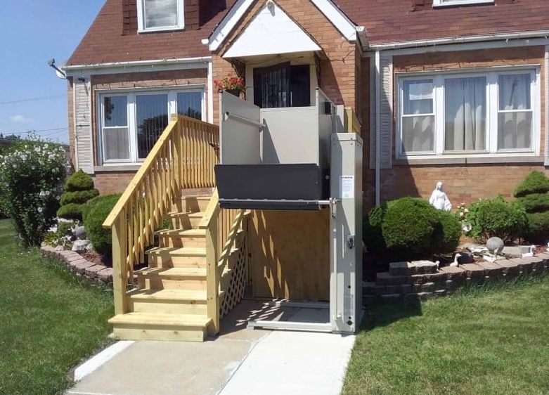 platform lift built with concrete pad and new wooden staircase by Lifeway Mobility