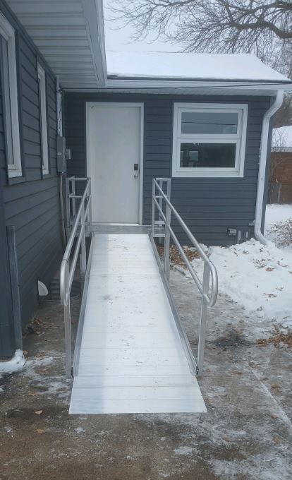 aluminum wheelchair ramp installed in winter by Lifeway Mobility