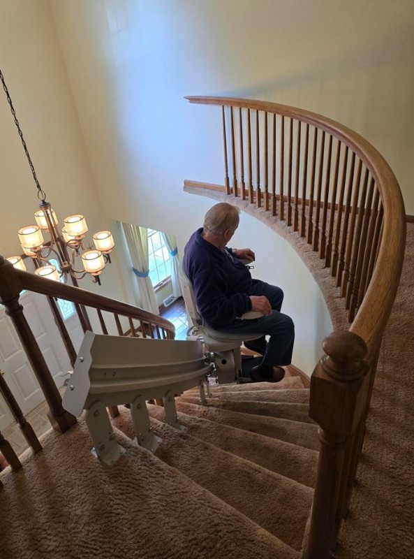 Lifeway Mobility customer rides new stairlift in home in northeastern OH