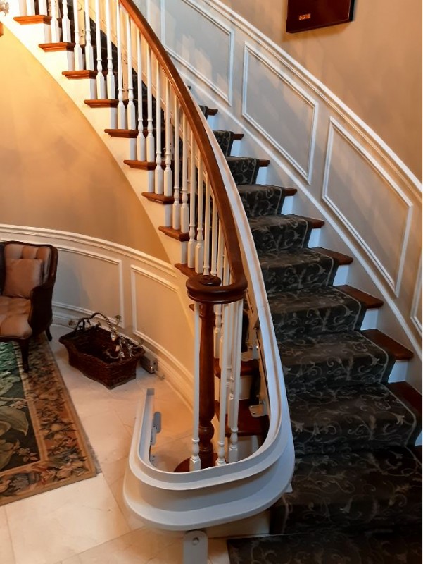 curved stair lift rail overrun installed in Northbrook IL