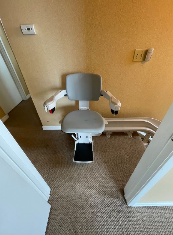 curved stairlift San Diego at top landing of stairs