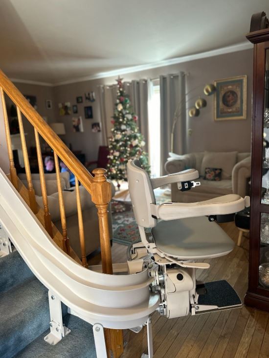 curved stairlift with 180 degree bottom overrun installed by Lifeway Mobility