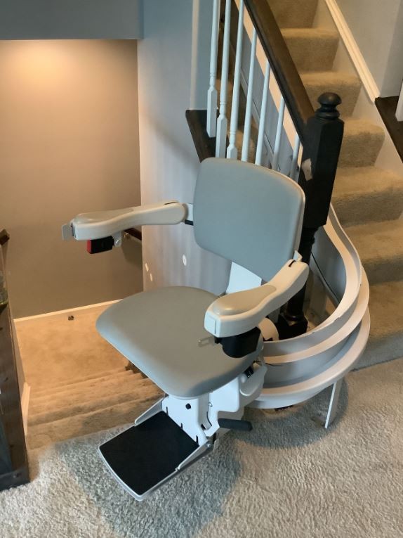 custom-curved-stairlift-bottom-landing-in-Maryland-home-from-Lifeway-Mobility.JPG