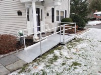 aluminum wheelchair ramp installed for safe access to front entrance of home in Danvers MA
