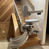 curved stairlift installed by Lifeway Mobility on basement stairs with 180 degree park position at bottom