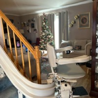 curved stairlift with 180 degree bottom overrun installed by Lifeway Mobility