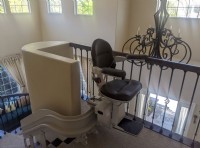 custom curved stairlift with black upholstery installed by Lifeway Mobility in Redwood City California