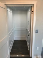 residential elevator with white interior installed by Lifeway Mobility in Los Angeles