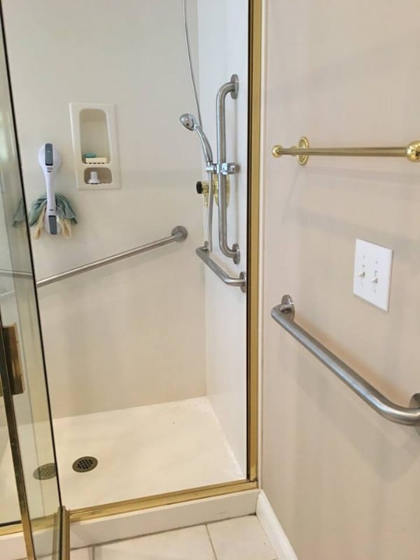 horizontal and vertical grab bars in bathroom in Indiana home