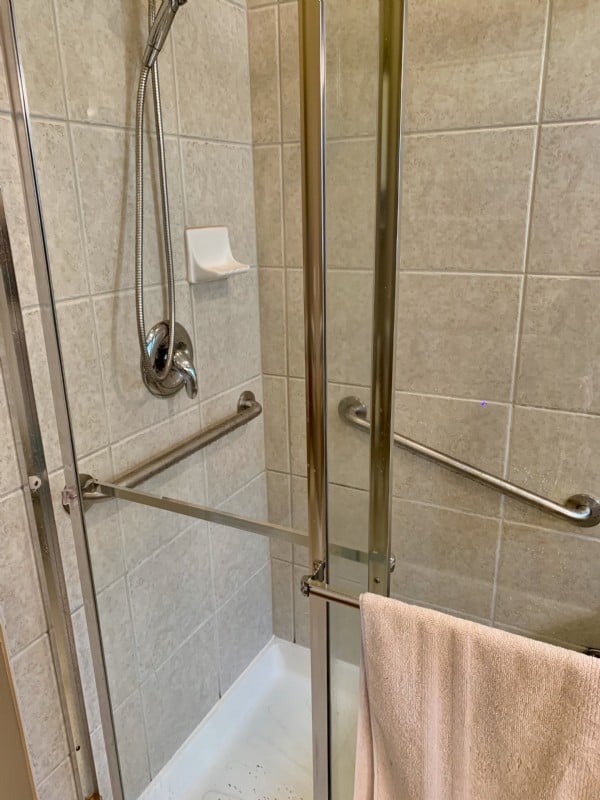 polished grab bars in shower in Indianapolis home