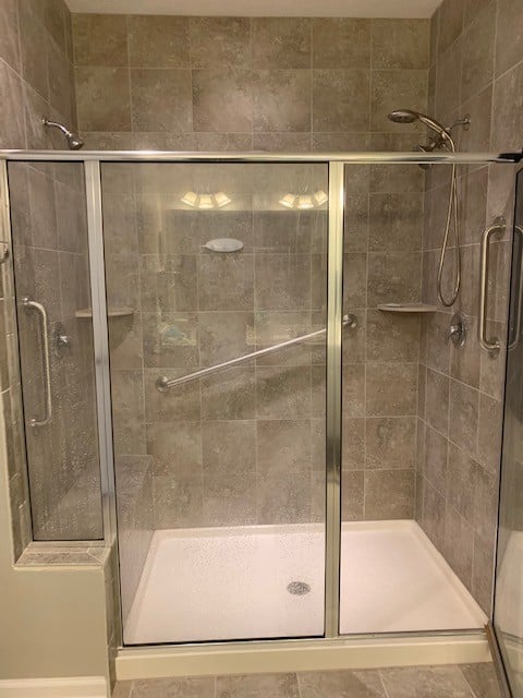 shower with three grab bars