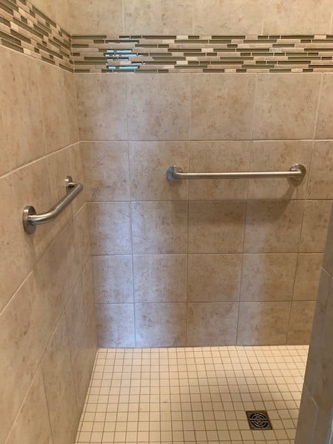 two horizontal grab bars installed in shower in Indianapolis home