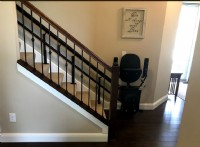 Harmar Helix stairlift at bottom landing of staircase