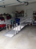 modular aluminum wheelchair ramp in garage